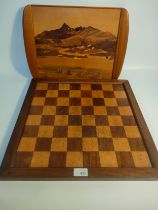 A British Stroud chess & co chess board along with an antique hand crafted tray depicting mountain