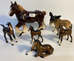 A collection of animal figures to include Beswick horses