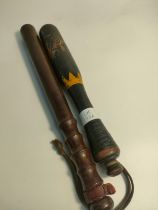 William IV wooden truncheon together with one other.