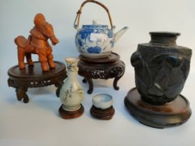 A collection of oriental collectables; Antique Chinese blue & white tea pot with drainer insert,