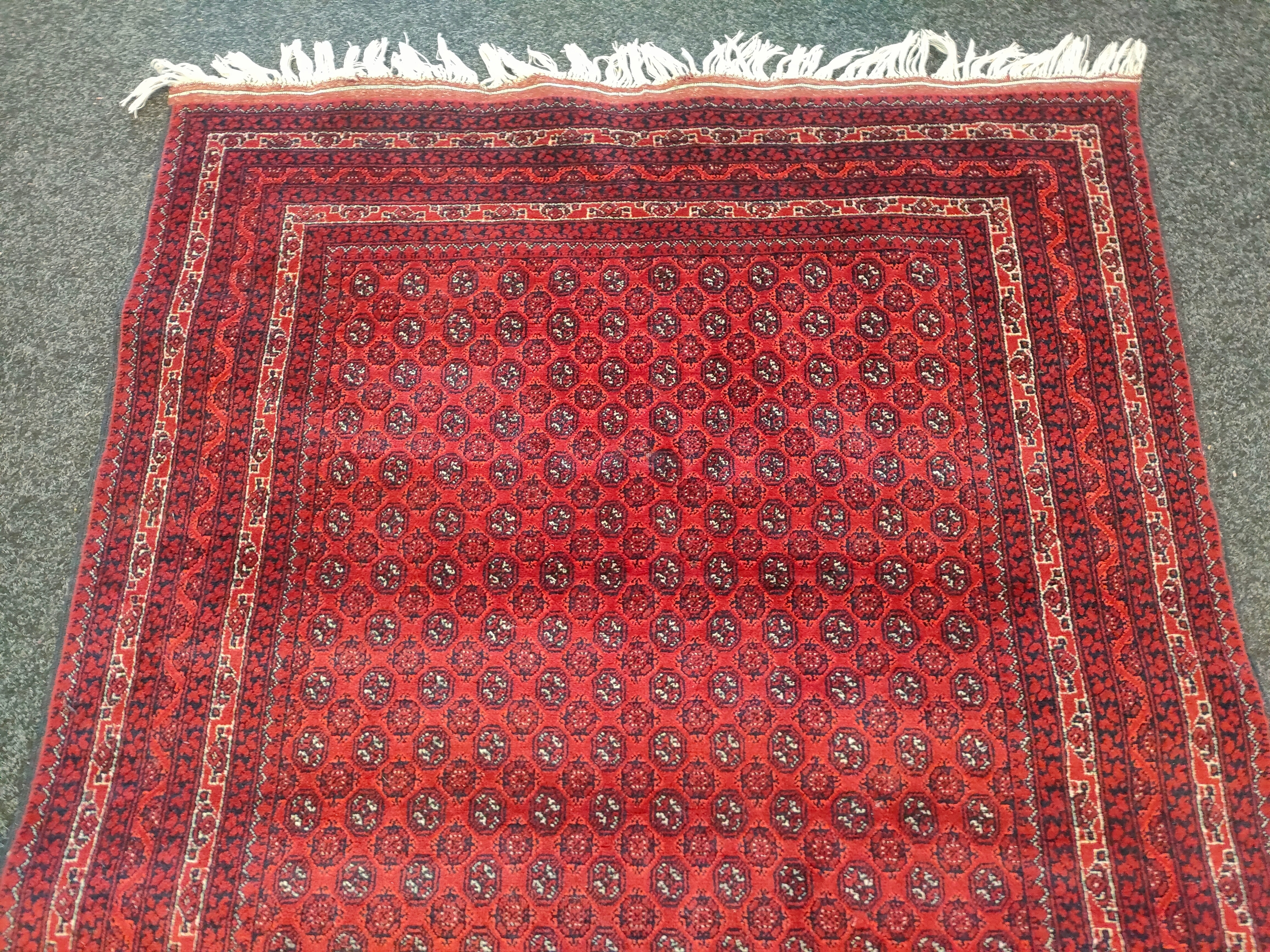 A Large Afghan hand woven red rug with shite trimming [201x154cm] - Image 3 of 4