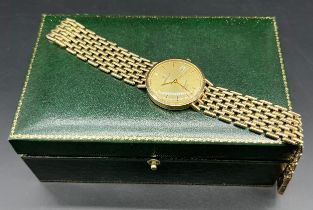 9ct yellow gold Sovereign Gent's wristwatch with box and loose gold links. [36.08grams]
