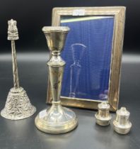 Selection of silver hallmarked items and silver plated Indian bell. Silver photoframe, Silver pepper