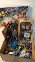 Box of Doctor Who toys & accessories