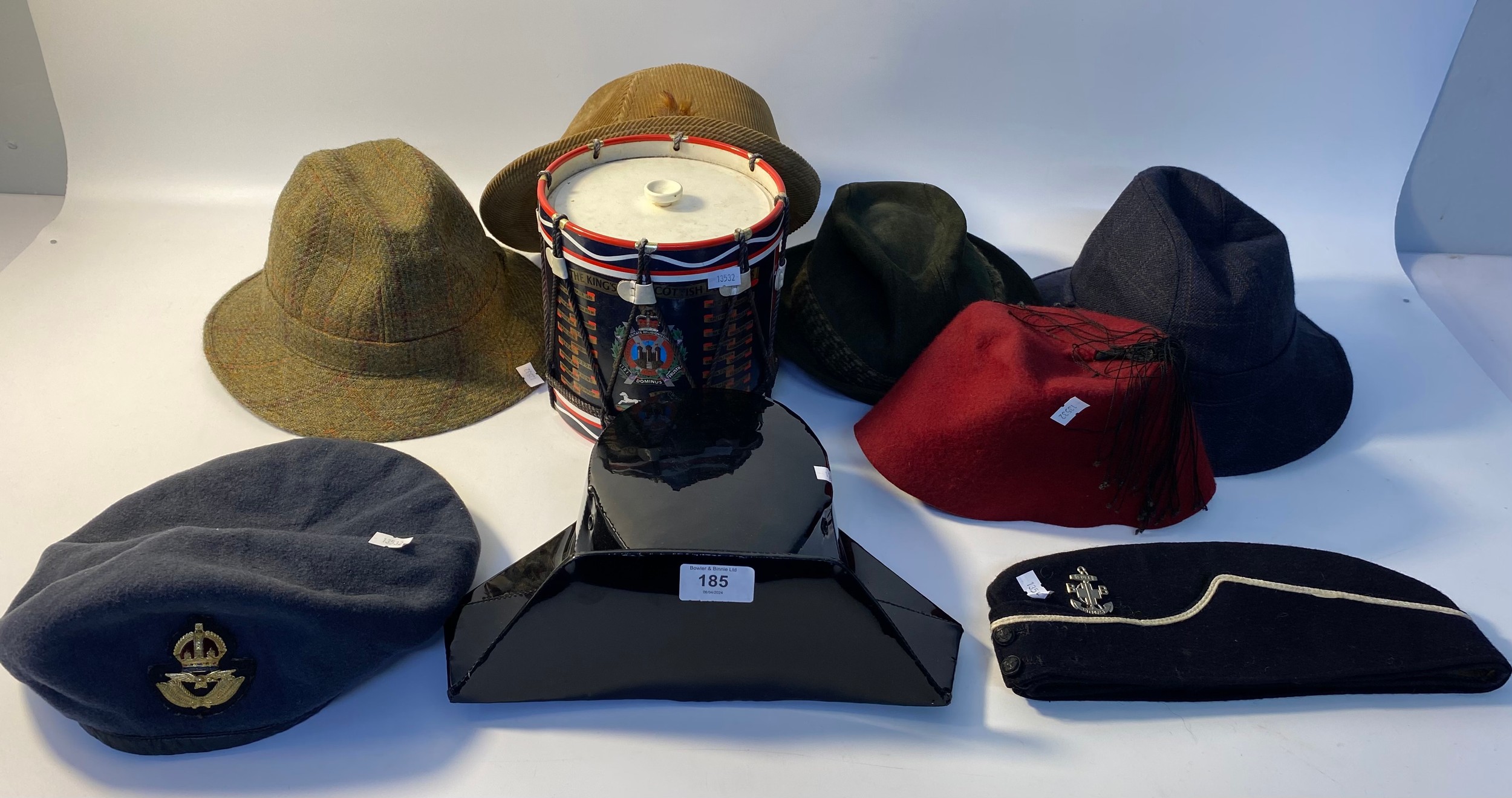 Vintage police hat & fez hat together with a Scottish military ice bucket
