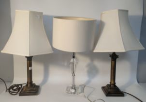 A Pair of brass Corinthian column table lamps along with crystal style table lamp