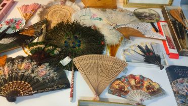 Large collection of Oriental fans, some within fitted boxes