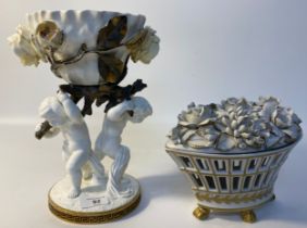 19th century Moore & co cherub based centre piece along with porcelain basket of flowers