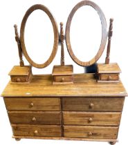 Contemporary his and hers dressing table with an arrangement of six drawers on bun feet. [163.