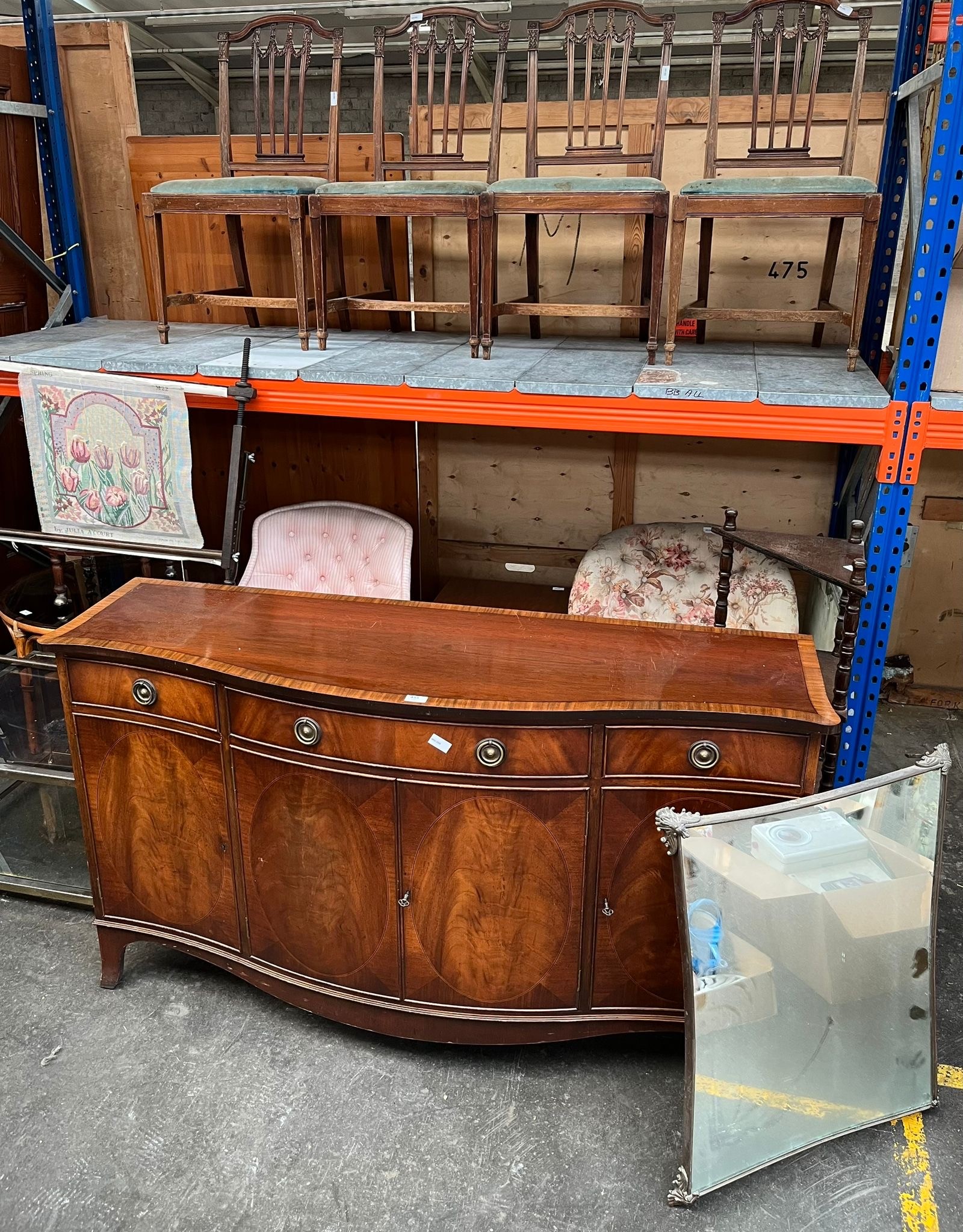 A Rack of furniture; Mahogany sideboard, Two vintage button back chairs, Four dining chairs, Mid