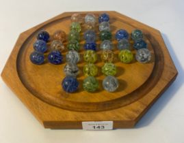 Vintage solitaire game with glass marbles