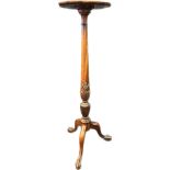 19th Century plant stand, the surface with scalloped edging raised on a tapered carved column and