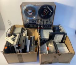 Akai 4000DB reel to reel recorder player with a vintage reel tapes with big names such as the