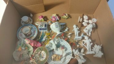 A box of collectables; flower porcelain design brooch, angel figures & art glass animals