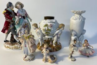 19th century German porcelain figures; Meissen three section Cherub centre piece & Dresden figures