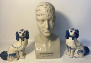 Vintage ceramic Phrenology head together with a pair of Staffordshire wally dugs [42cm]