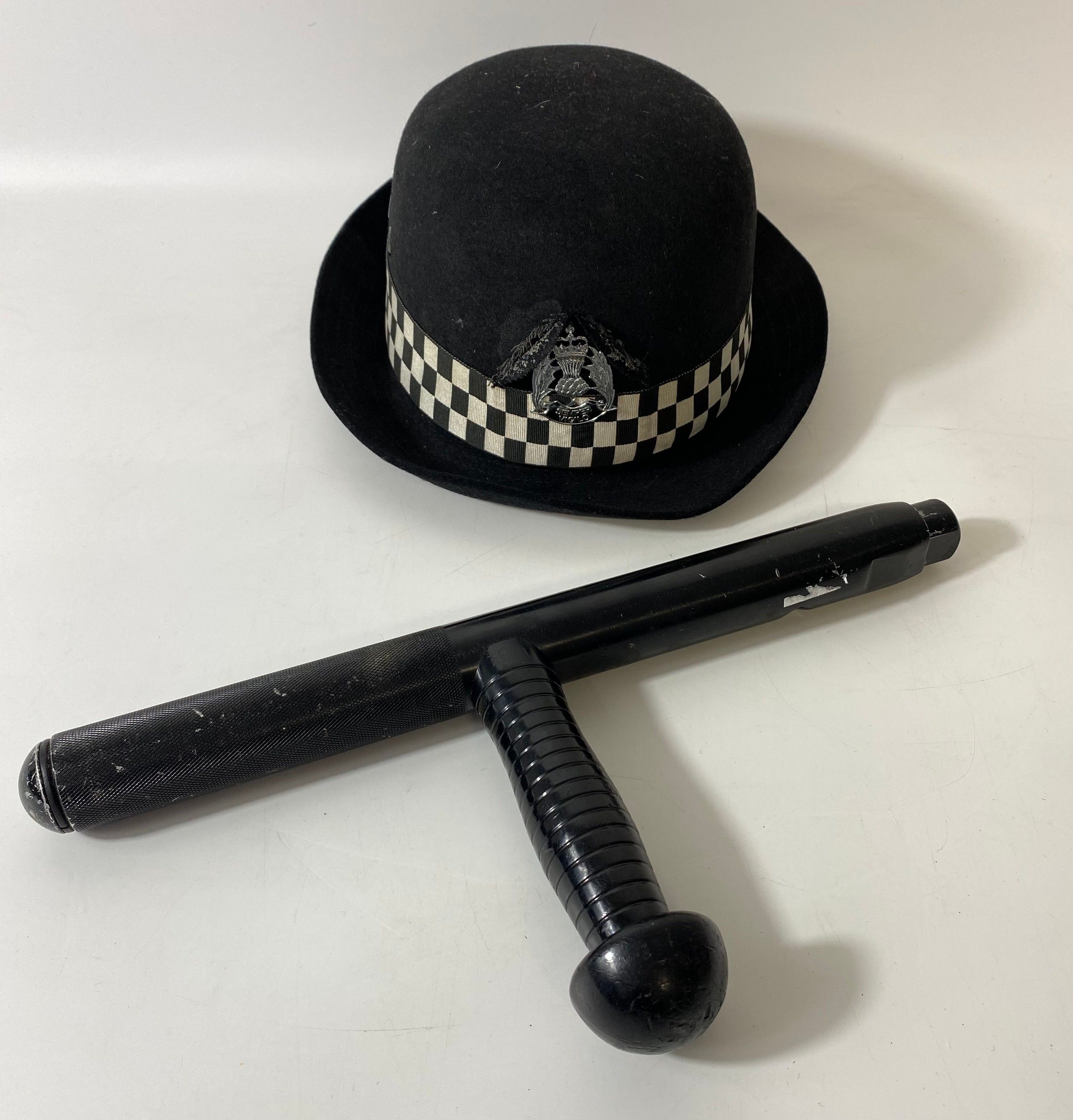 Fitzwilliam U.S Patent monadnock expandable Police baton, together with a obsolete woman’s C.W