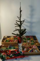 A large collection of antique Christmas decorations & 1900s Christmas tree