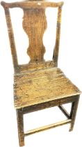 Antique oak chair, the back with carved central splat raised on block legs