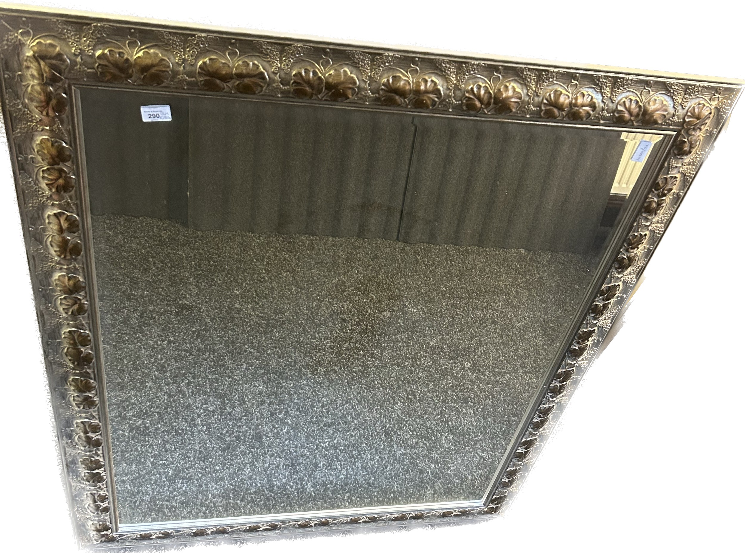 Large contemporary bevel edge mirror with a foliate design to the frame [134x109cm]