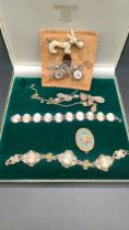 A selection of jewellery; vintage cameo bracelets , 2 spider brooches, art deco dog brooch & Italian