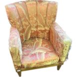 Antique chair, the shell shaped back, above cushioned arms and seat raised on short turned tapered