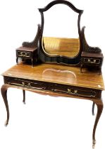 Antique mahogany dressing table, the shaped bevel edge mirror flanked by pierced scroll support
