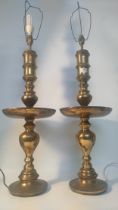 A Pair of 20th century heavy brass Indian scene table lamps
