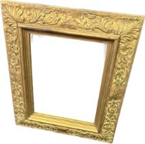 Wooden foliate and gilt painted framed mirror [62x51.5cm]