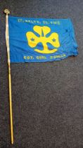 Kelty, Fife Girl Guide flag on pole with brass G&G plaque to the top. [233cm]