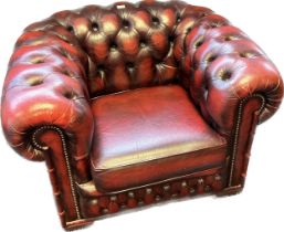 Chesterfield single tub armchair, covered in a red leather button upholstery