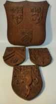 Collection of 19th century shield oak wall plaques [32x30cm]