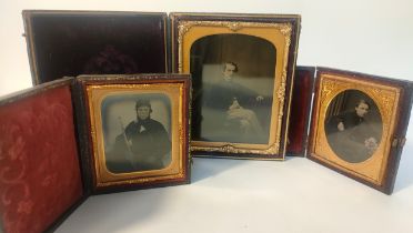 Three cased ambrotype portraits in fitted cases