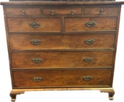 Antique mahogany chest of drawers, the rectangular top over three narrow drawers, two short