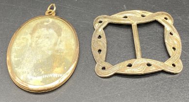 19th century handpainted portrait pendant mounted in yellow metal together with art deco belt buckle