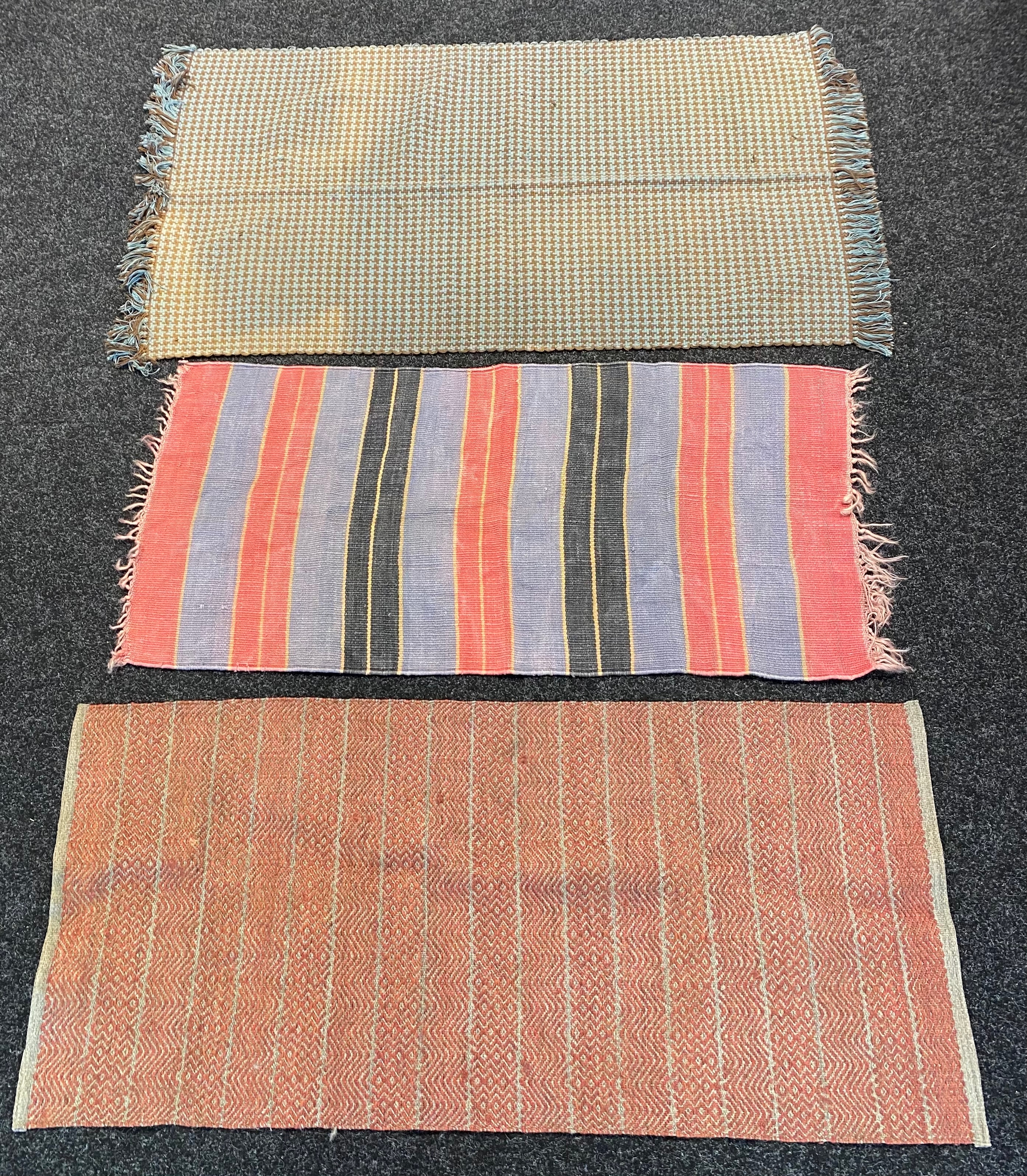 Three vintage rugs to include Pier 1 Imports handwoven rug