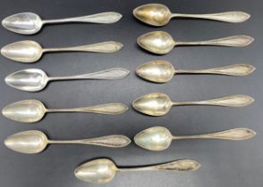 Collection of eleven 833 grade silver tea spoons by Van Kemper dating from 1906-1953 [116.76] grams