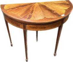 19th century mahogany half moon flip top table, raised on square tapered legs [72.5x91cm]