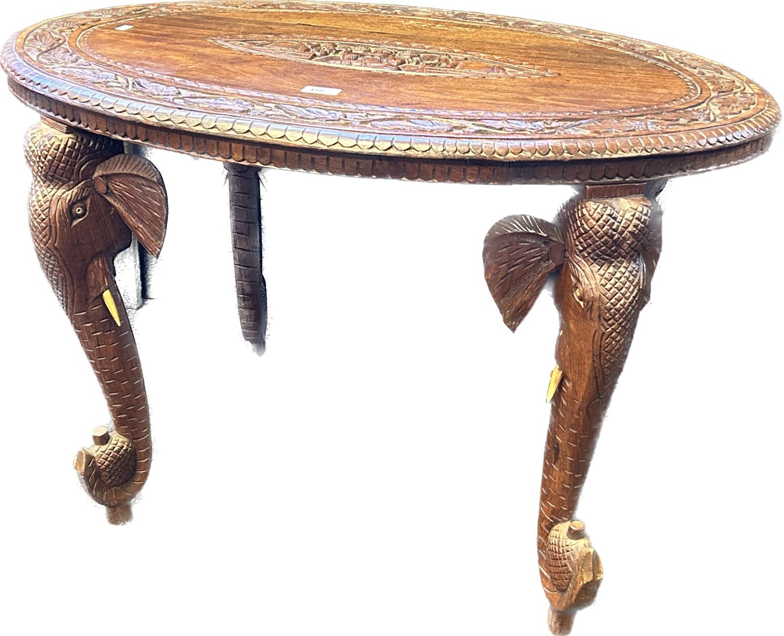 Anglo Indian rosewood table with the oval surface with carved foliate design, the centre with - Image 3 of 3