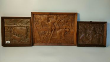 Three arts & crafts farming scenes raised relief hand carved plaques signed RB and BR