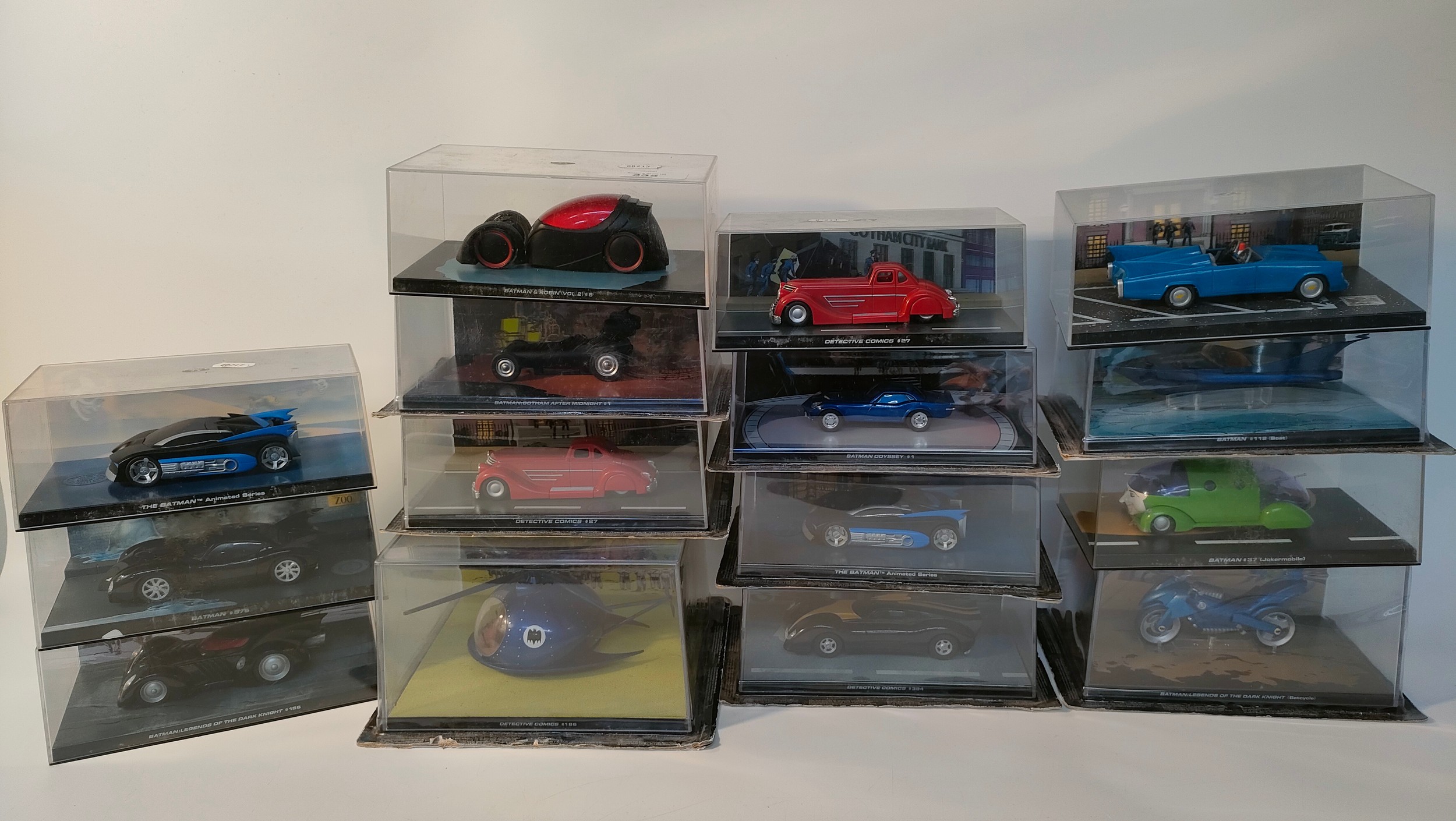 A collection of fifteen collectable batman vehicles models