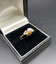 9ct Gold ring set with pearl & clear stone [size K] [1.85] grams