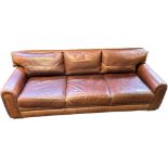 Contemporary tan leather 3 seat settee with brass nail head trim