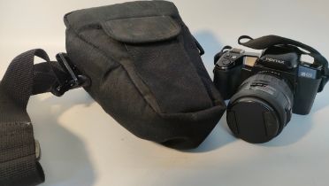Pentax camera model Z-10 with fitted bag