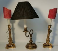 Pair of brass 1900s candle sticks along with a heavy brass wall sconce [all converted to