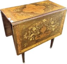 19th century Dutch table, the drop ends raising to a marquetry surface, the base with further