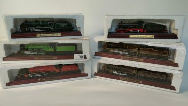 A collection of six train models; Lner ' flying scotmans & Duchess Lms on plinths