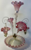 Large antique glass Epergne centre piece. Pink and opalescent spouts, two twist hanging canes. [54cm