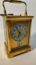 Antique French brass mantle clock in working order with key [9.5x13cm]