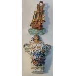 An Art Deco Ditmar Urbach of Czechoslovakia painted pottery wall plaque; modelled as a galleon along